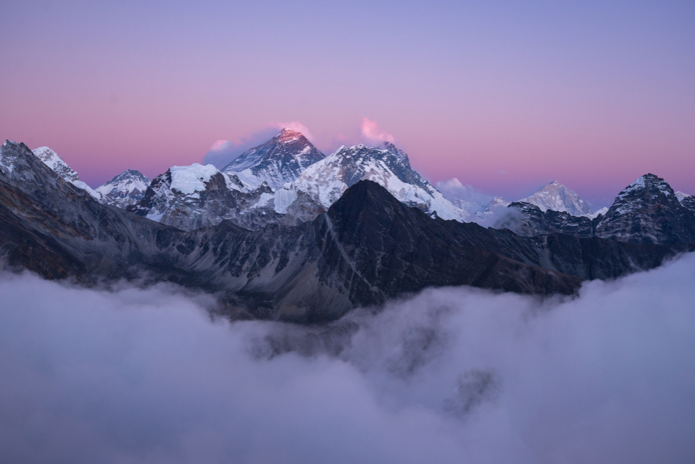mount-everest-covered-with-snow-white-clouds